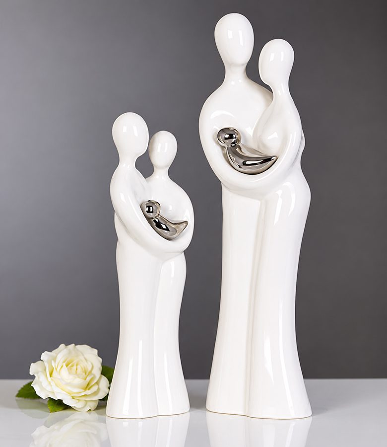 familiebeeld wit glas met zilverkleurige baby